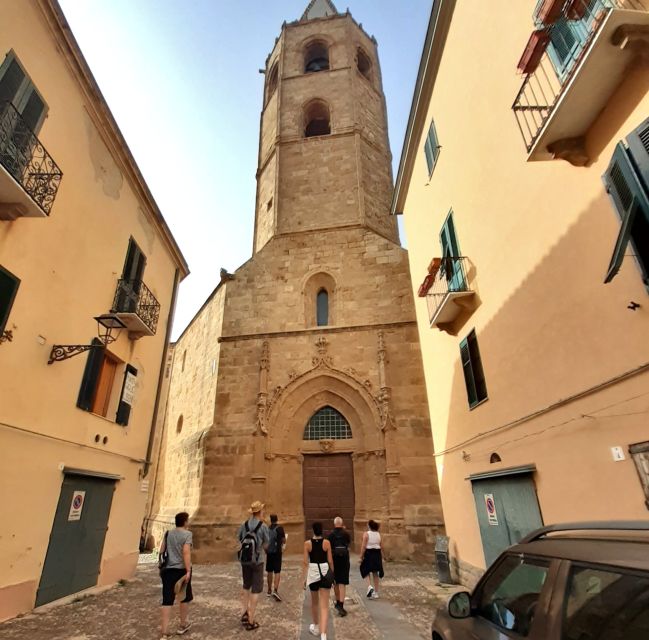 Alghero: Historic Center Walking Tour with A Local Guide - The land gate, sea gate, and city inside the walls
