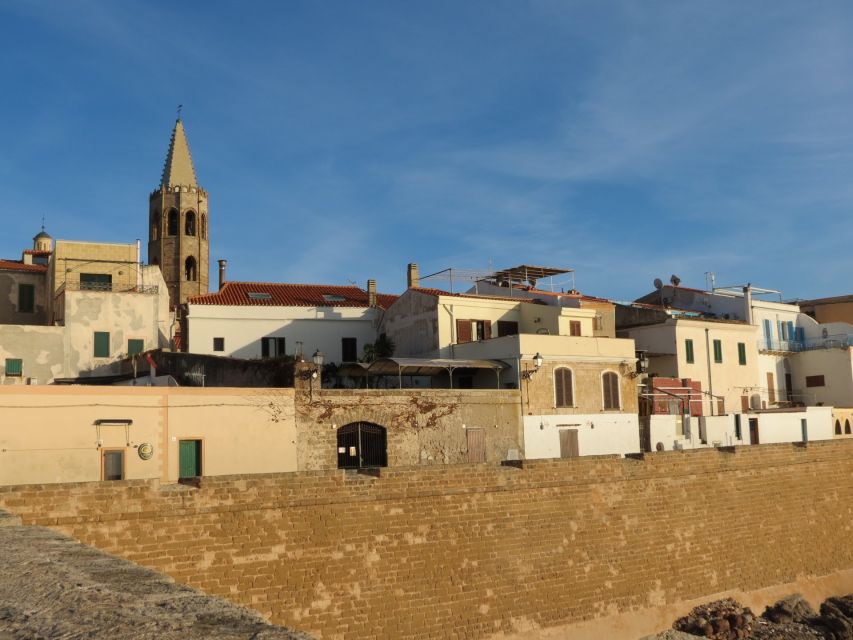 Alghero: Historic Center Walking Tour with A Local Guide - Following the Aragonese towers and sea walls