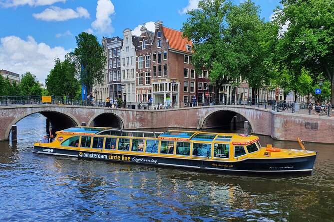 Amsterdam: Historic City Sightseeing Canal Cruise - Commentary, seating, and weather