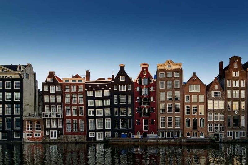 Amsterdam: Iconic Canals & Historic Sights Walking Tour - Starting beneath the National Monument in Dam Square