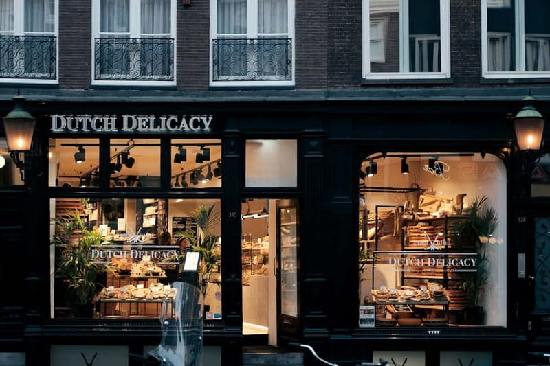Amsterdam: Iconic Canals & Historic Sights Walking Tour - What the two-hour format really gives you