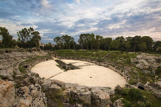 Ancient Syracuse: private guided tour of the Neapolis archaeological park - The Roman amphitheater and a change of era