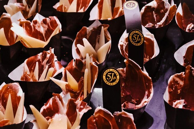 Barcelona Tapas Walking Tour: Food, Wine & History - What the four stops may feel like