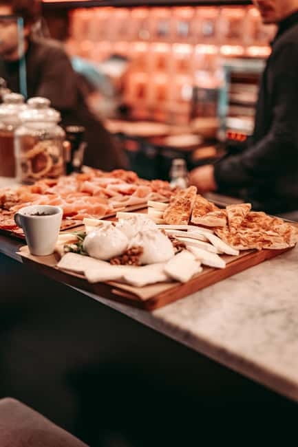 Barcelona: Tipsy Tapas & History Tour in the Gothic Quarter - First stop: two classic bites in a tucked-away bar