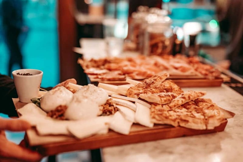 Barcelona: Tipsy Tapas & History Tour in the Gothic Quarter - Walking the old quarter between bites