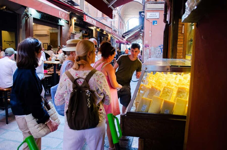 Bologna: Street Food Tour in the Historic Center - The first bites: Parmigiano, balsamic and warm bread