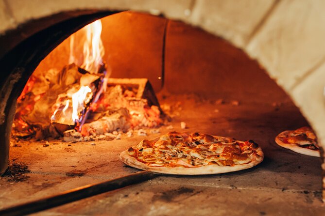 Boston Pizza Lovers Food and History Walking Food Tour - Three pizza slices, three different stops