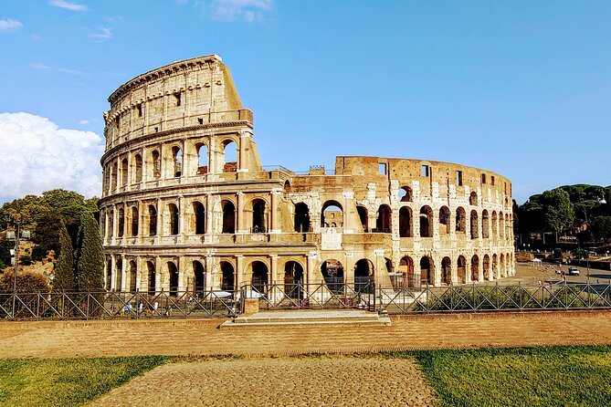 Colosseum & Ancient Rome Guided Walking Tour - Entering the Colosseum and its deadly arena