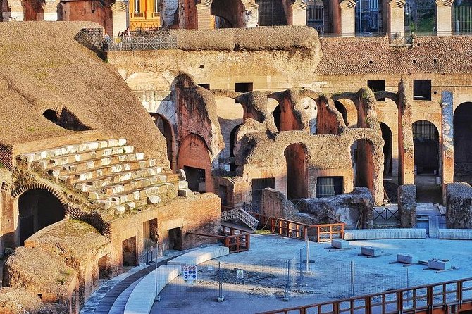 Colosseum Express Guided Tour and Ancient Rome Admission Included - Entering the Colosseum with a timed group