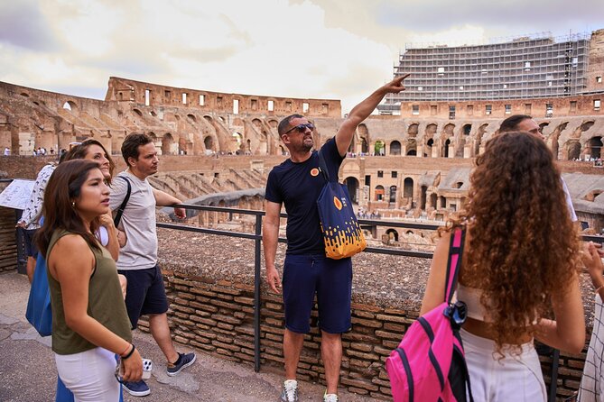 Colosseum, Roman Forum & Palatine Hill Guided Tour - Entering the Colosseum with a guide