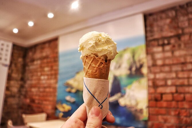 Dublin Historical Centre Food Tour with 8 Food Tastings & Drinks - Irish cheese in a popular local restaurant