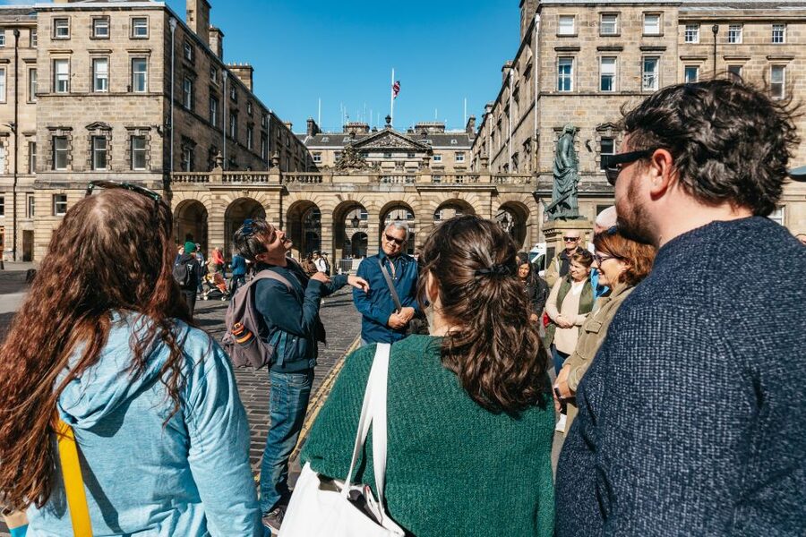 Edinburgh: Old Town History and Tales Walking Tour - Meeting Adam Smith before entering the Old Town