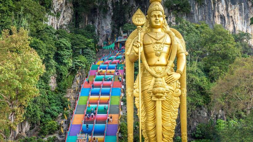 From Kuala Lumpur: Private Batu Caves Cultural Tour - Batu Caves begins with a gold statue and a long climb
