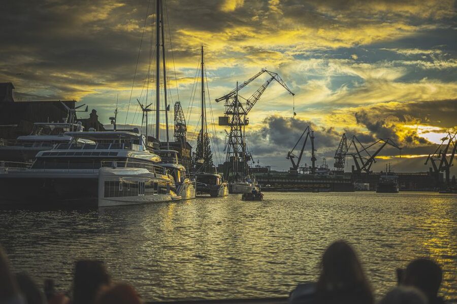 Gdańsk: Sunset Cruise on a Historic Polish Boat - Boarding a 12-seat Polish galley