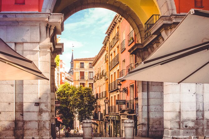Guided Tour of Madrid of the Austrias and the Historic Center - Meeting beneath the yellow umbrella at Puerta del Sol