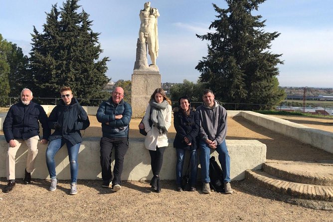 Historical Italica: Half-Day Guided Tour from Seville - Transport, timing, and group size