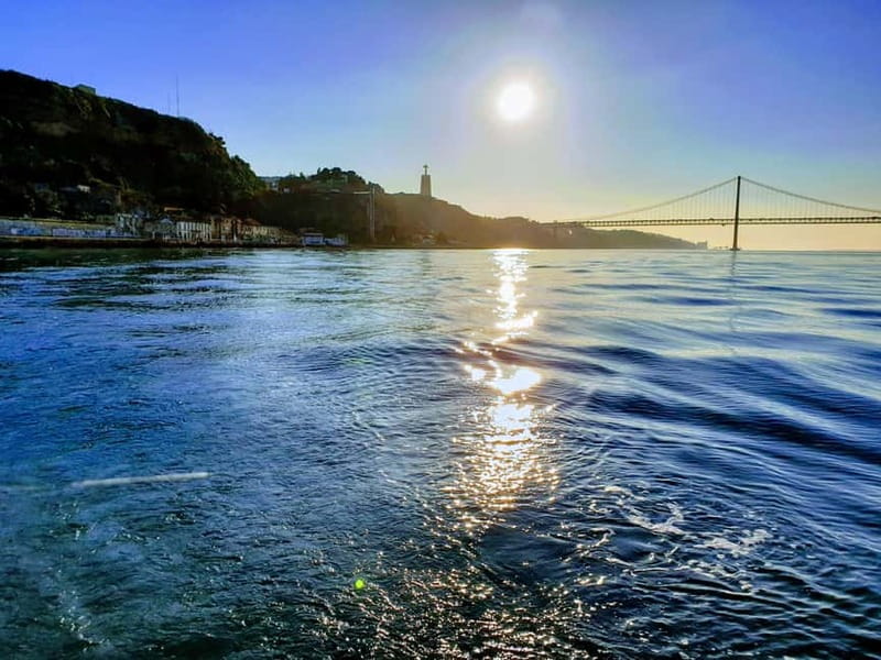 Lisbon: Daytime or Sunset Boat Cruise with History and Wine - Belém Tower and Jerónimos Monastery from the water