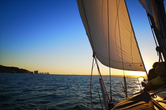 Lisbon Sunset Sailing with Portuguese Wine and History - Alfama and Lisbon Cathedral from the water