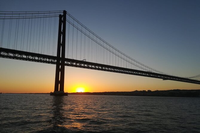 Lisbon Sunset Sailing with Portuguese Wine and History - A wider sweep past the central waterfront