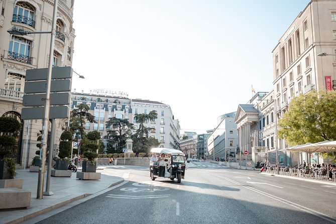 Madrid Historical Tour with Local Guide in Eco Tuk Tuk Private - Food, markets, and everyday Madrid