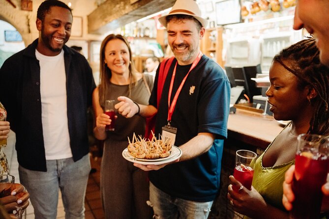 Madrid Tapas & Taverns Small Group Food & History Tour - La Casa del Abuelo and Garlic Shrimp