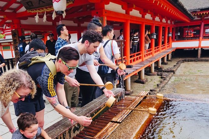 Miyajima Half-day Trip Historical Walking Tour - Walking along the coast to the Otorii Gate