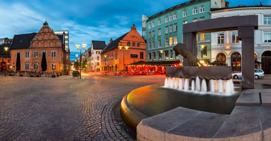Oslo: Historic Myths & Legends Evening Walking Tour - Christiania Torv and the city beneath the city
