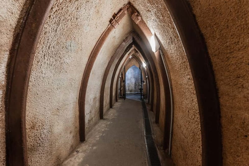 Pilsen: Historic Underground Tour with a Glass of Beer - Passageways, wells, and two levels of cellars