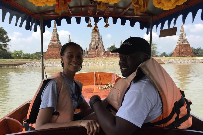 Private Excursion to Ayutthaya, UNESCO World Heritage site with Boat Tour - Wat Mahathat and the Buddha in the tree roots