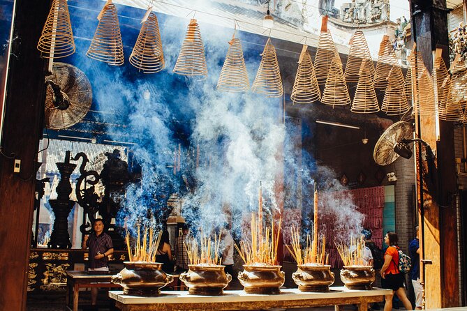 Saigon Unseen, History, & Hidden Gems Sightseeing Motorbike Tour - Wet markets and flowers in District 10