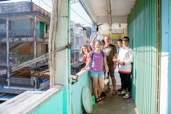 Saigon Unseen, History, & Hidden Gems Sightseeing Motorbike Tour - Chinatown and an ancient temple in District 5