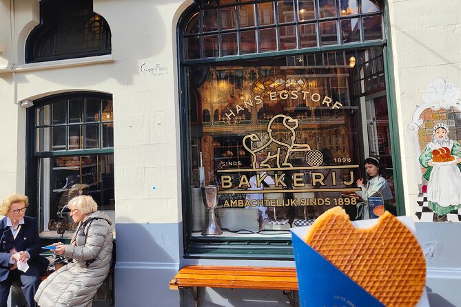 Skipping Lines & Sipping Beers: A History Tour of Amsterdam - Walking Amsterdam through canals and side streets