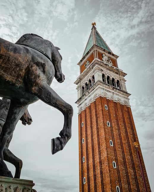 Venice: The History of St. Mark's Basilica Tour - Meeting the host between the lions